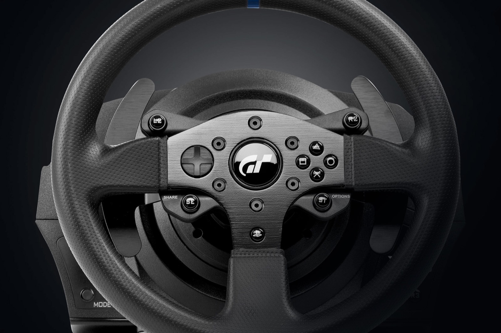 Thrustmaster racing wheel close-up on the test rig